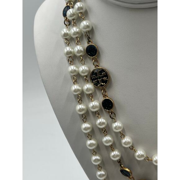 Tory Burch Authentic Long
Pearl Logo Medallion
Multi-Strand Gold 60" Necklace - Picture 9 of 15